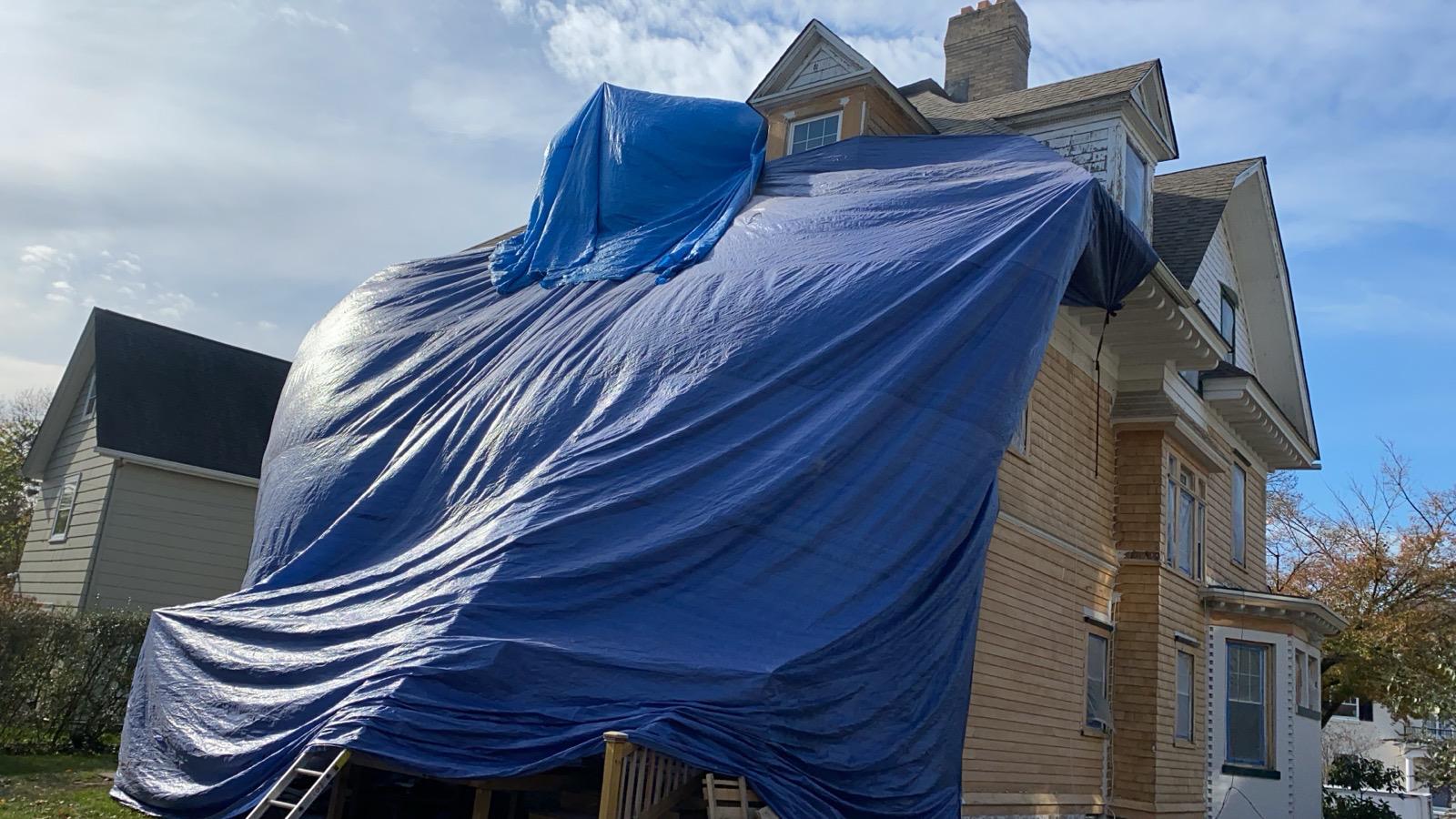 Exterior sanding and paint in progress — photo 3 of 9