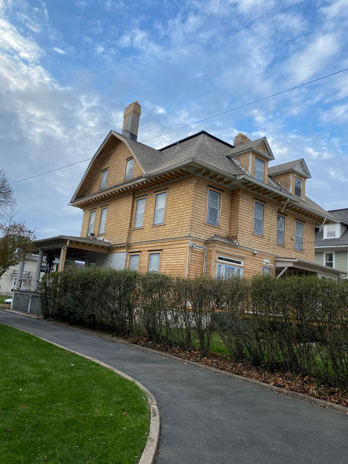 Exterior sanding and paint in progress — photo 5 of 9