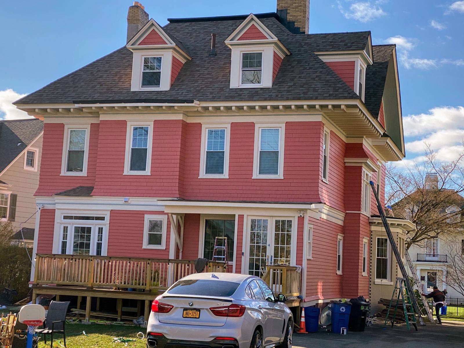 Exterior sanding and paint in progress — photo 7 of 9