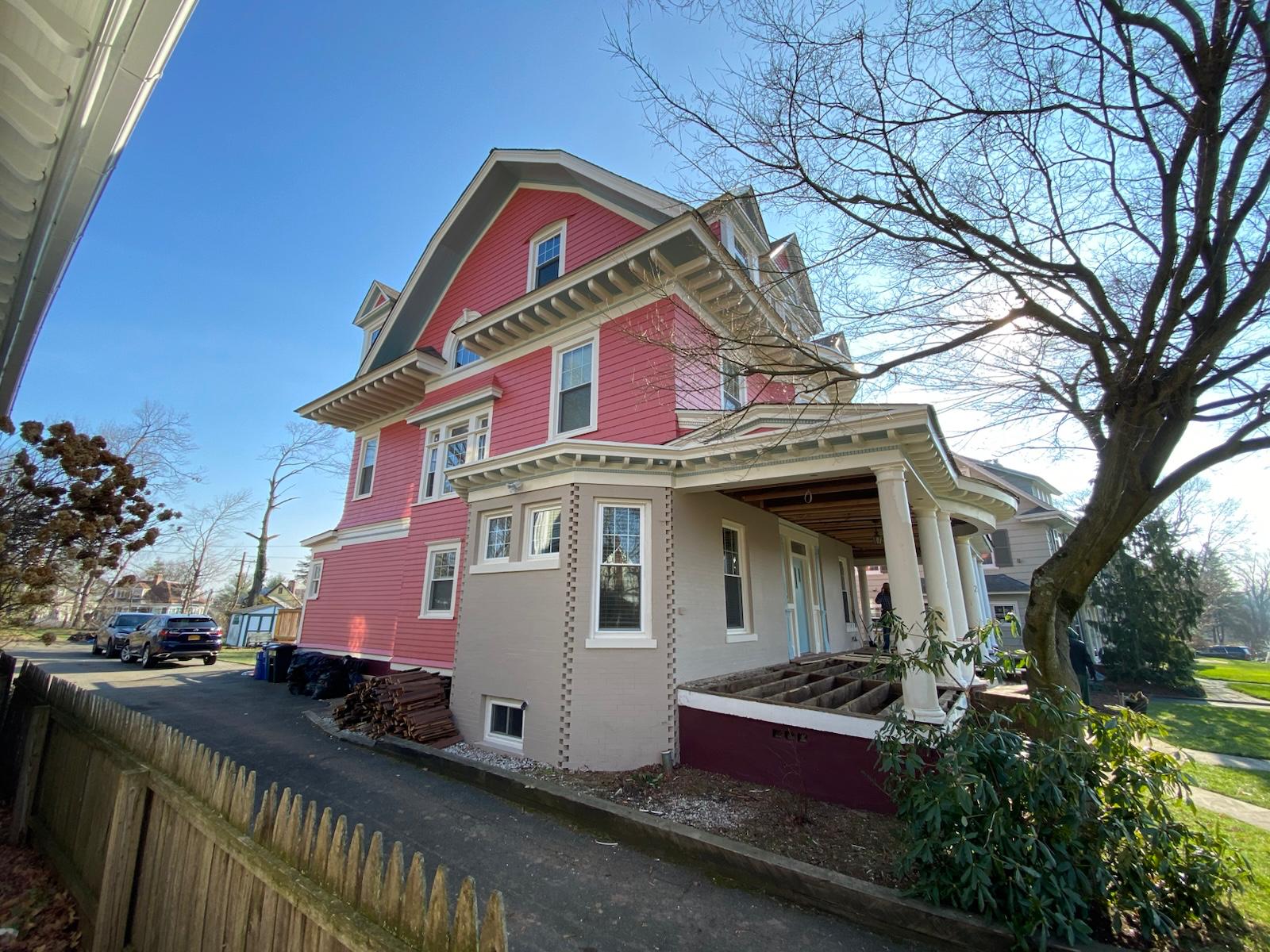 Exterior sanding and paint in progress — photo 8 of 9