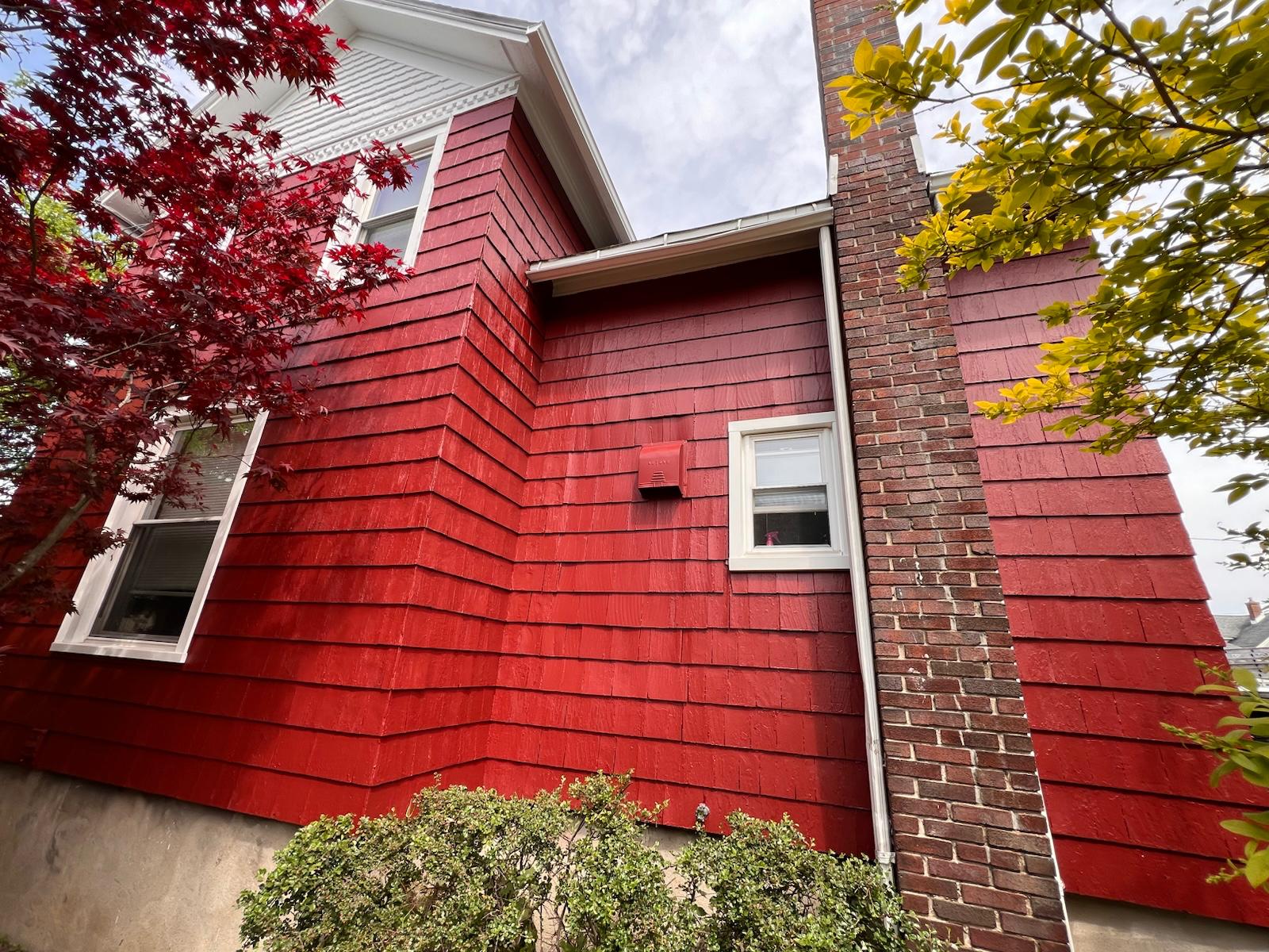 Home exterior with refreshed siding and trim — photo 4 of 4