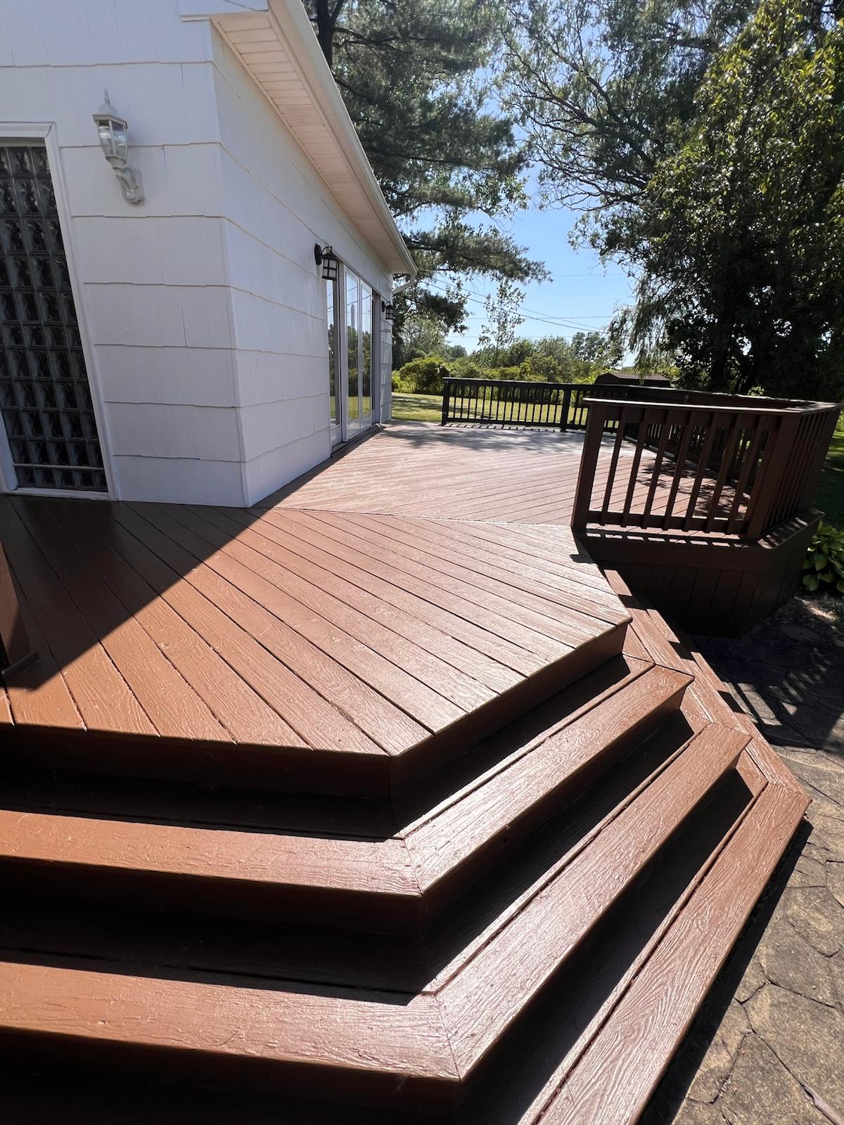 Exterior deck painting in progress — photo 4 of 5
