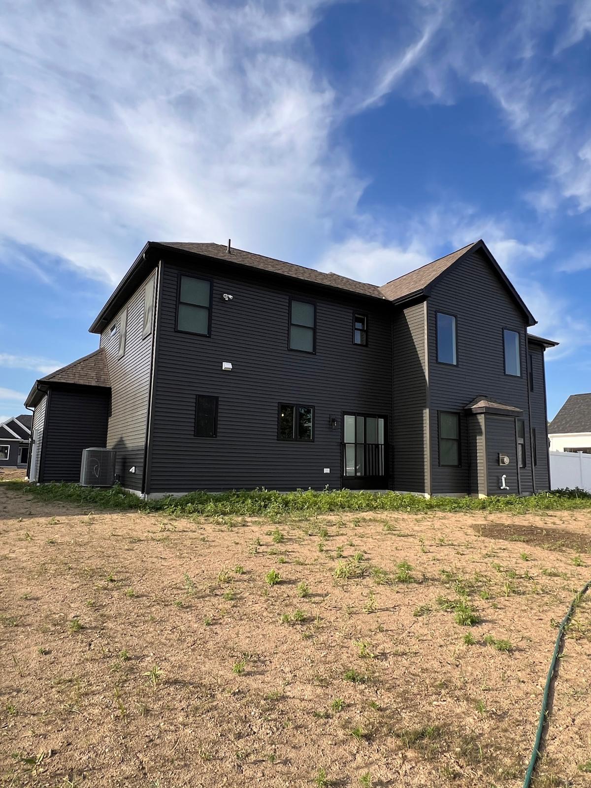 Exterior prep and painting in progress — photo 3 of 4