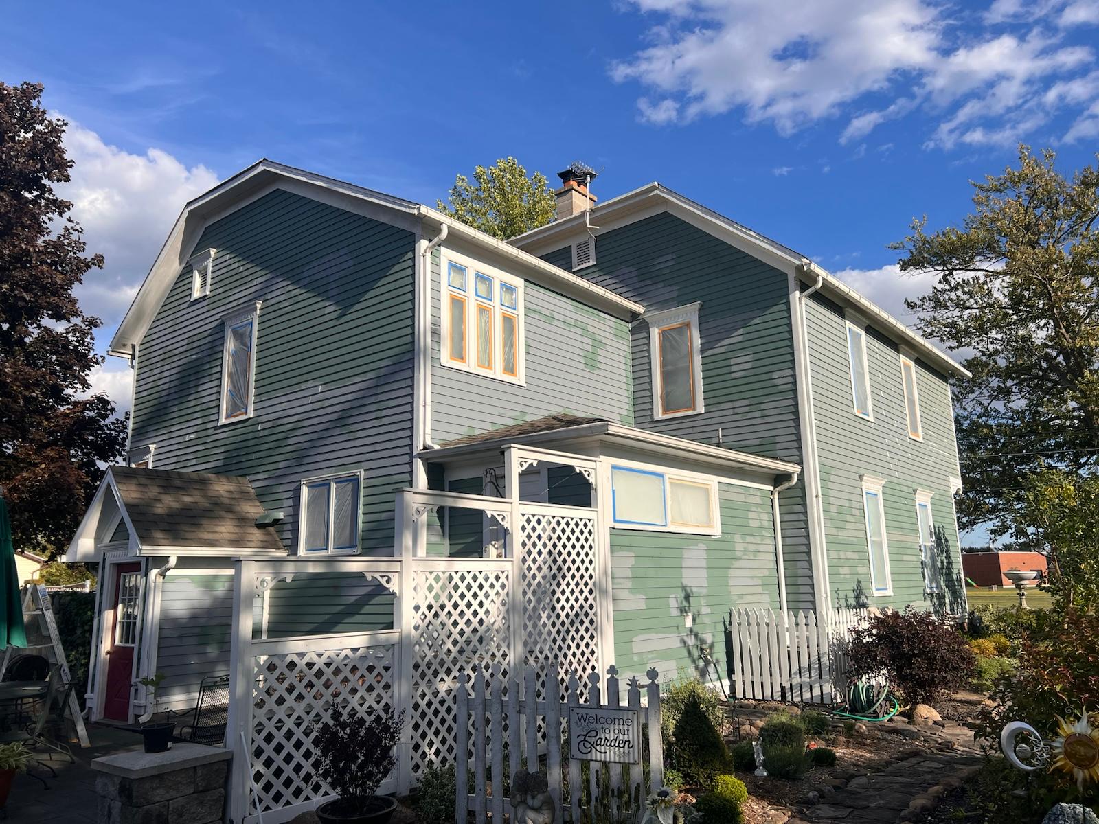 Exterior scraping and prep in progress — photo 5 of 10