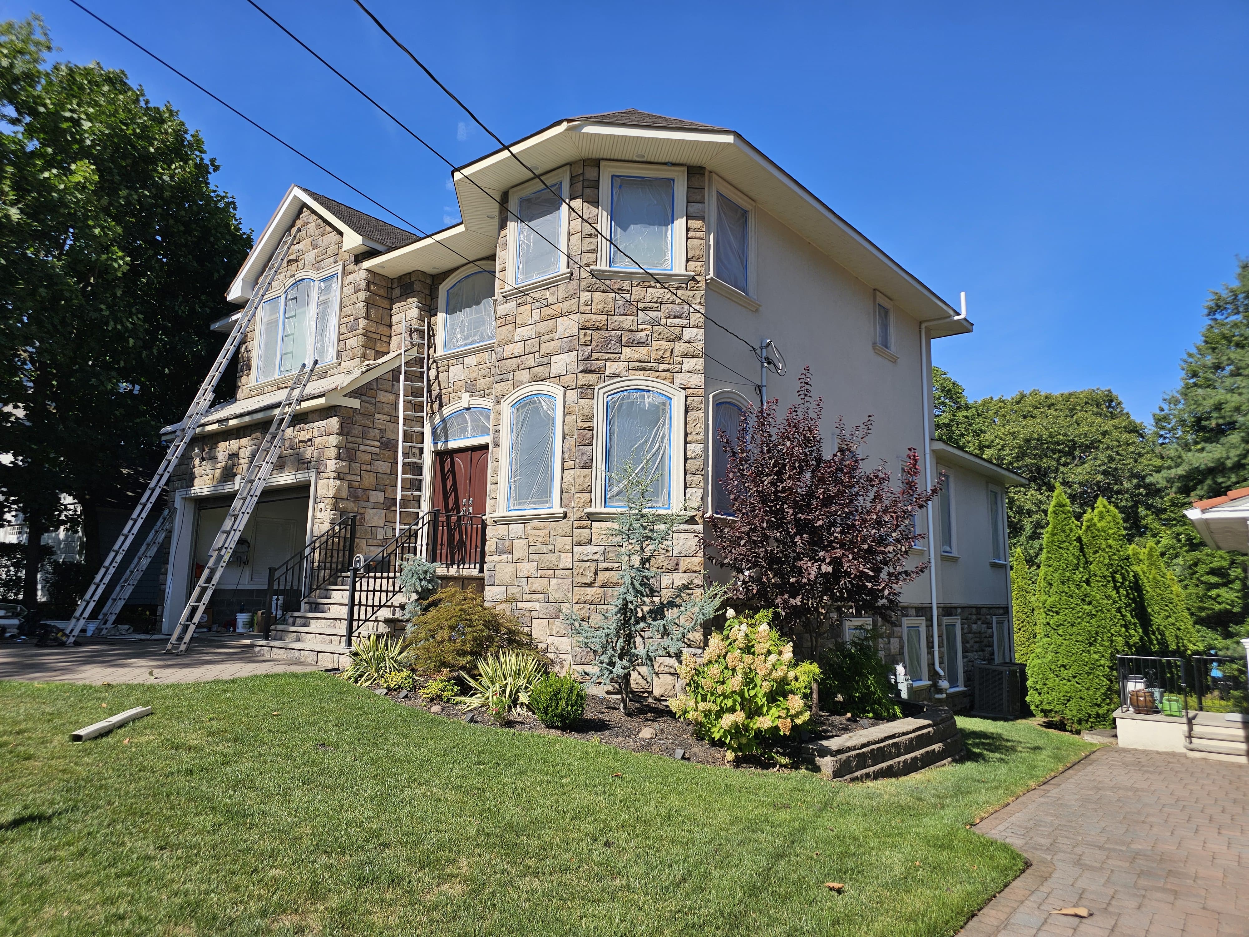 Exterior stone and painted surfaces — photo 1 of 2