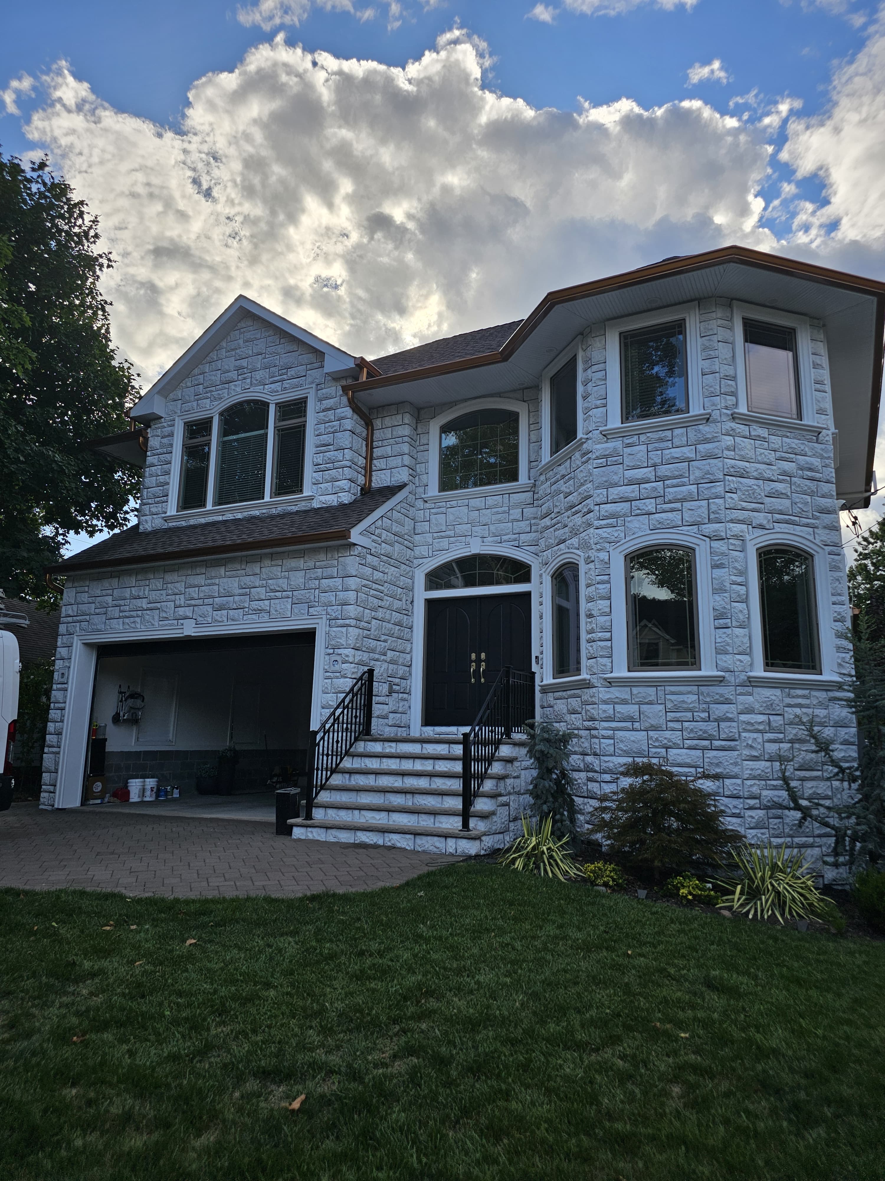 Exterior stone and painted surfaces — photo 2 of 2
