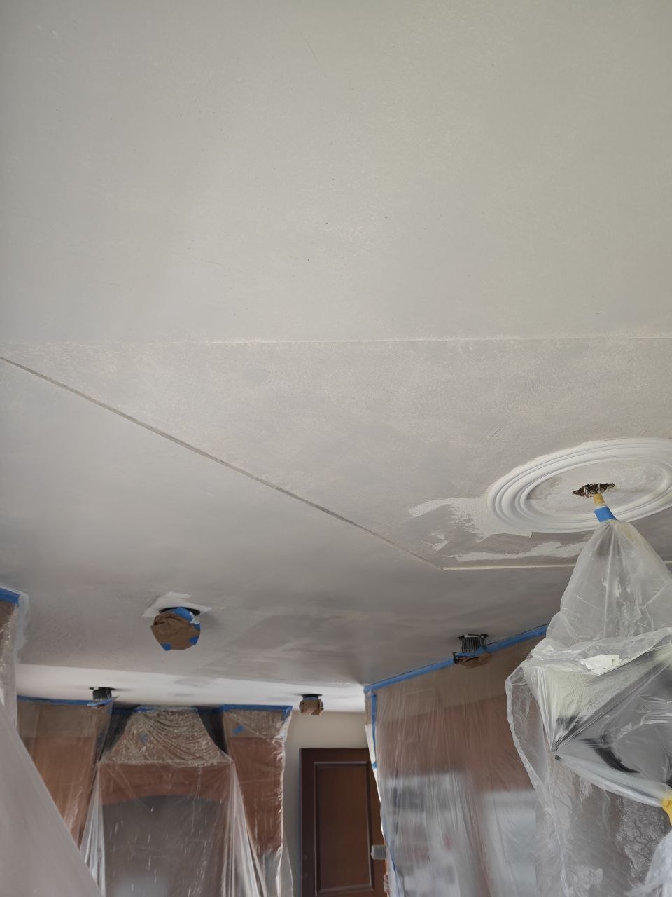 Popcorn ceiling removal in progress — photo 11 of 19