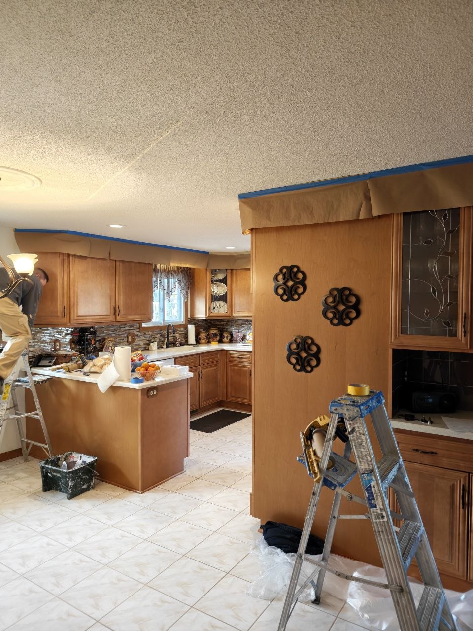 Popcorn ceiling removal in progress — photo 6 of 19